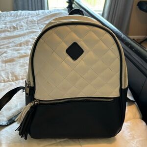 White & black mini backpack. Great used condition!